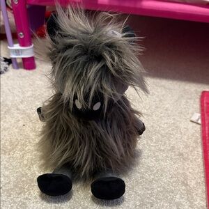 Gray and Black Plush Toy